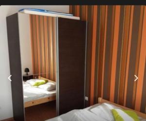 Posteľ alebo postele v izbe v ubytovaní Blue Star 3 Wellness Apartman Siófok