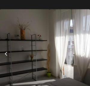 Posteľ alebo postele v izbe v ubytovaní Blue Star 3 Wellness Apartman Siófok