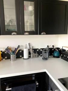 A kitchen or kitchenette at Appartement Saint Germain en Laye