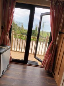 Balkón nebo terasa v ubytování Rathgillen Cabin