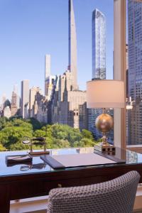an office with a desk with a view of the city at Trump International New York in New York