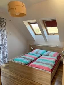 Cama o camas de una habitación en Apartamenty ANNA