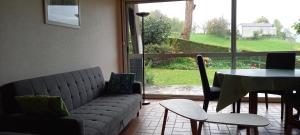 Posedenie v ubytovaní Terrasse, jardin,, Appartement 80m², vue montagne, wifi, bureau + 12 fotografií