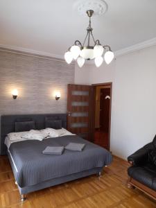 Posteľ alebo postele v izbe v ubytovaní Zöld Sziget Apartmanlakás