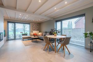 Posezení v ubytování Vakantiewoning De Bles