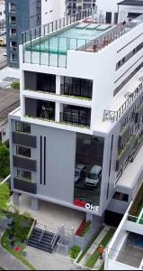 an aerial view of a building with a car garage at Loft aconchegante à Beira-Mar in João Pessoa