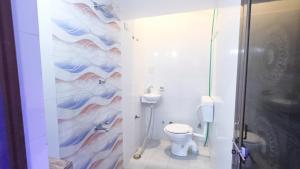 Ένα μπάνιο στο Gokul Niwas Home Stay Three