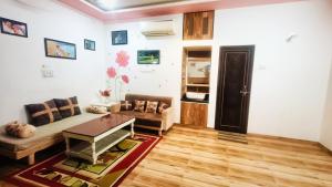 Χώρος καθιστικού στο Gokul Niwas Home Stay Three