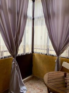 Posezení v ubytování Apartmani Asper + 12 fotografií