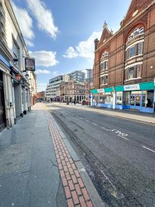 an empty street in a city with buildings at the upper floor in Croydon