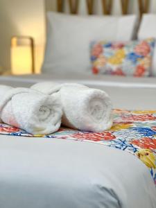 Cama ou camas em um quarto em Atoq Paracas Reserva