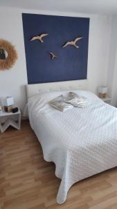 Postel nebo postele na pokoji v ubytování T4 89m2, Cap d'Agde, Secteur Falaise, Vue mer, Clim, 8 pers, WIFI, 100 m plage