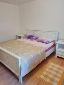 Postel nebo postele na pokoji v ubytování Apartment Bataja