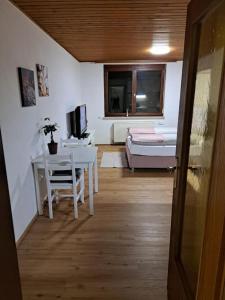 Ένα ή περισσότερα κρεβάτια σε δωμάτιο στο Ferienwohnung Zanier