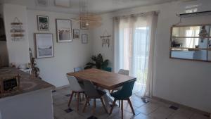 Kuchyň nebo kuchyňský kout v ubytování T4 89m2, Cap d'Agde, Secteur Falaise, Vue mer, Clim, 8 pers, WIFI, 100 m plage