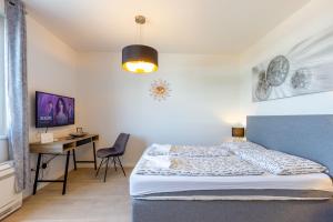 Posteľ alebo postele v izbe v ubytovaní Tiffy studio w private parking