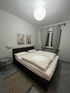 Voodi või voodid majutusasutuse Bozen - voll ausgestattet, optimale Lage toas