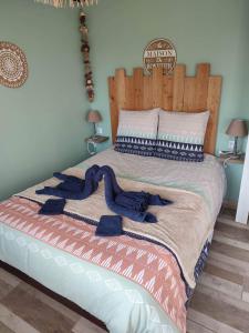 Ένα ή περισσότερα κρεβάτια σε δωμάτιο στο Le Cocooning à 10 minutes D’Etretat