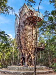 a large metal sculpture of a bird at Private Tulum Villa in Exclusive Secured Community in Tulum