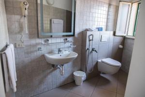 Um banheiro em Hotel Villino Gallodoro
