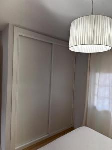 Postel nebo postele na pokoji v ubytování Los Cancajos Apartamento Acijoa