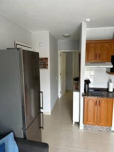 Kuchyň nebo kuchyňský kout v ubytování Los Cancajos Apartamento Acijoa