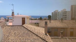 a view of roofs of buildings in a city at IGiDELUX in Era de Soler