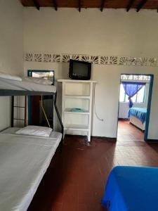 Postel nebo postele na pokoji v ubytování Finca la Pola