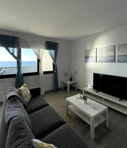Posezení v ubytování Moderno apartamento frente al mar