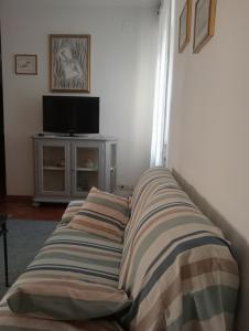 Posteľ alebo postele v izbe v ubytovaní Casa Azzurra