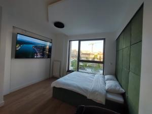 Postel nebo postele na pokoji v ubytování PARK APARTMENTS Belgrade Waterfront + 37 fotografií