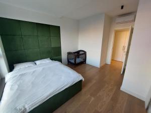 Voodi või voodid majutusasutuse PARK APARTMENTS Belgrade Waterfront toas