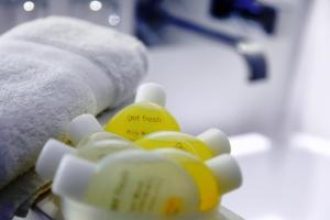 a close up of a group of bottles of soap at Fresh Boutique Hotel in Mýkonos City