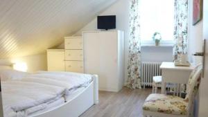 Postel nebo postele na pokoji v ubytování Gaestehaus Denecke
