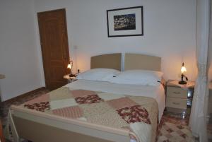 Postel nebo postele na pokoji v ubytování Hotel Boutique Osumi