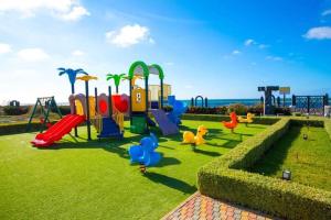 Ο χώρος παιχνιδιού για παιδιά στο Garden Bay - Appartement en bord de mer