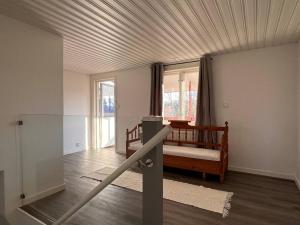 Postel nebo postele na pokoji v ubytování Lantlig villa i Ljungbyhed