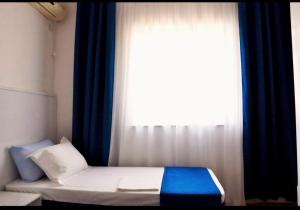 Postel nebo postele na pokoji v ubytování Tirana Central GuestHouse