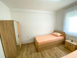 Ένα ή περισσότερα κρεβάτια σε δωμάτιο στο Rooms LikeHome