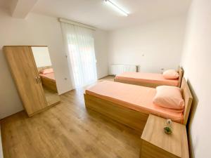 Ένα ή περισσότερα κρεβάτια σε δωμάτιο στο Rooms LikeHome