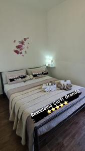 a bedroom with two beds in a room at Curti Granda in Rescaldina