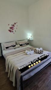 Postel nebo postele na pokoji v ubytování Curti Granda