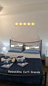 Postel nebo postele na pokoji v ubytování Curti Granda