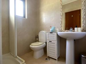 Koupelna v ubytování Golf Villa Alvor By CORAL + 8 fotografií