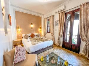 Postel nebo postele na pokoji v ubytování Riad des Lys