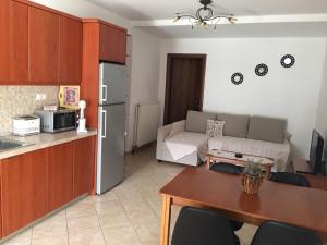 Kuchyň nebo kuchyňský kout v ubytování Bali House