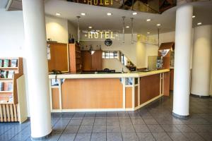 Lobby o reception area sa IBB Hotel Passau Sued