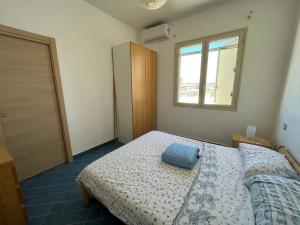 Postel nebo postele na pokoji v ubytování Veranda sul mare di Donnalucata