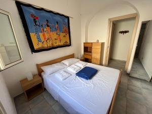 Postel nebo postele na pokoji v ubytování Veranda sul mare di Donnalucata