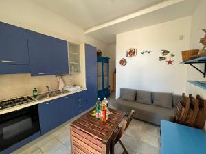 Kuchyň nebo kuchyňský kout v ubytování Veranda sul mare di Donnalucata